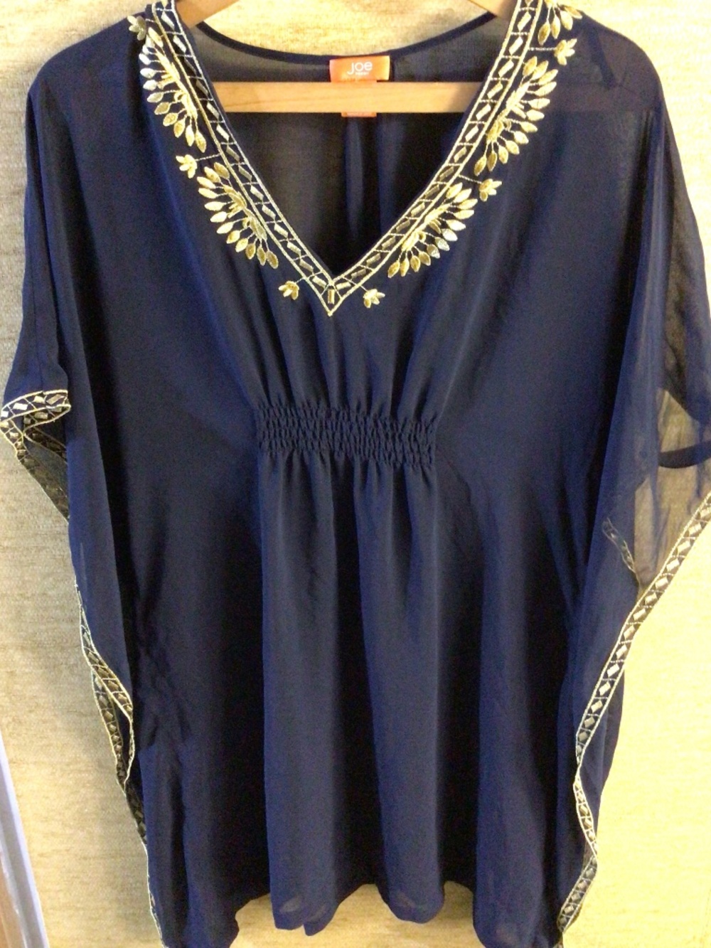 Women’s size medium navy swim suit cover with gold trim